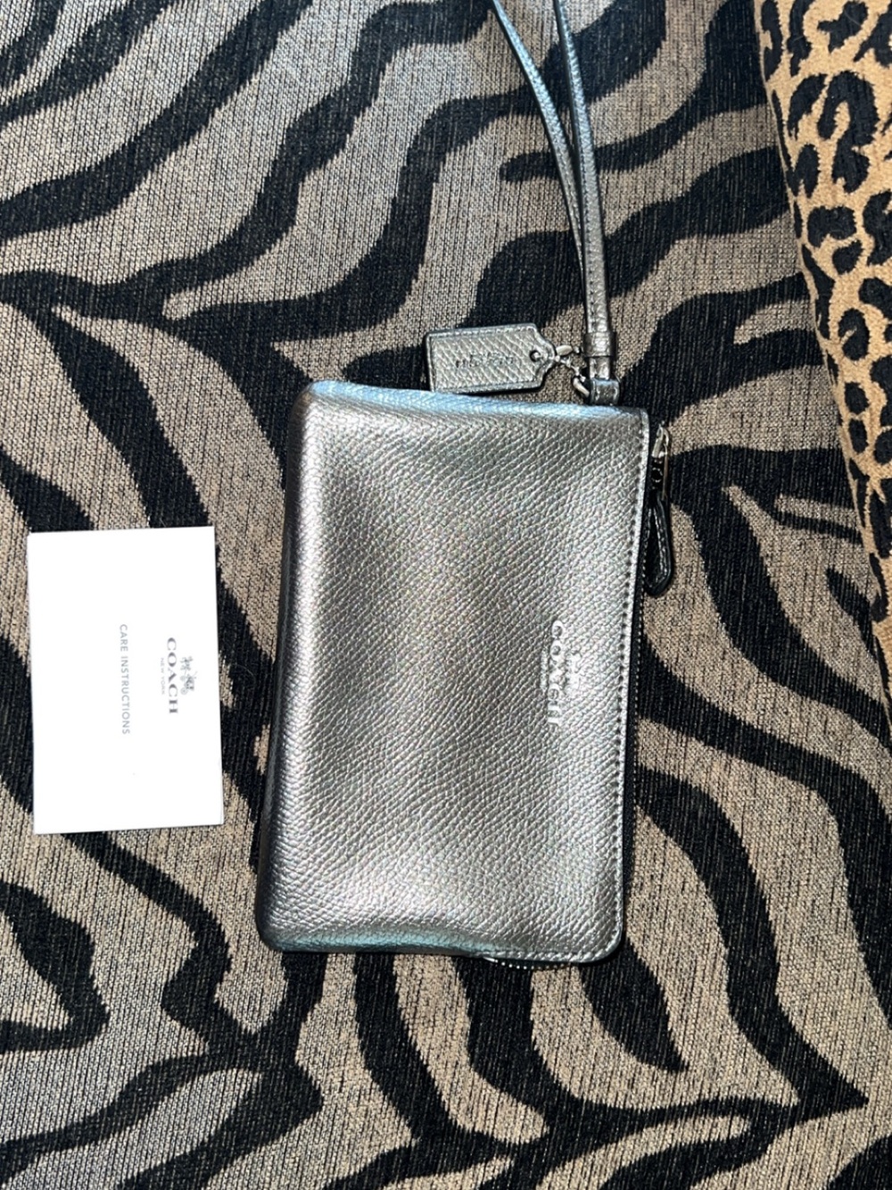 Coach Metallic Silver Leather Wristlet Phone Case